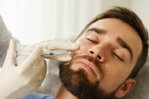 A man receiving dermal fillers
